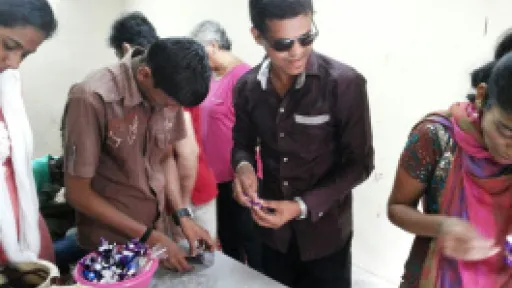 Students wrapping chocolates